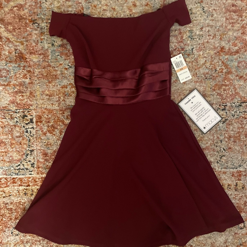 Off the shoulder red dress. From the brand B.Darlin